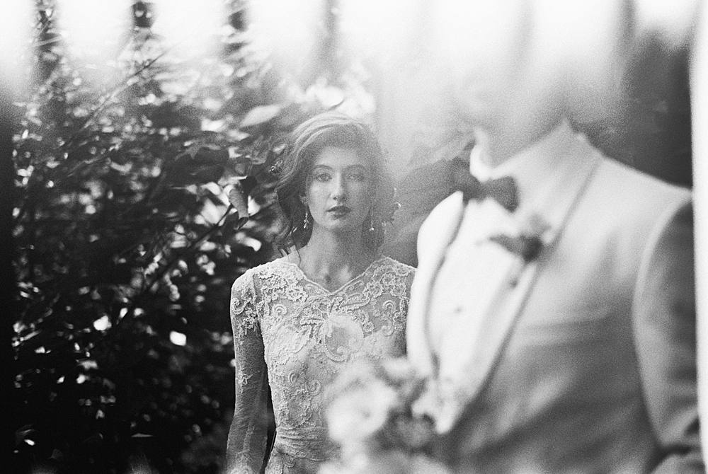 light leak 35mm film image from leica m-a of bride and groom in charleston sc wedding editorial