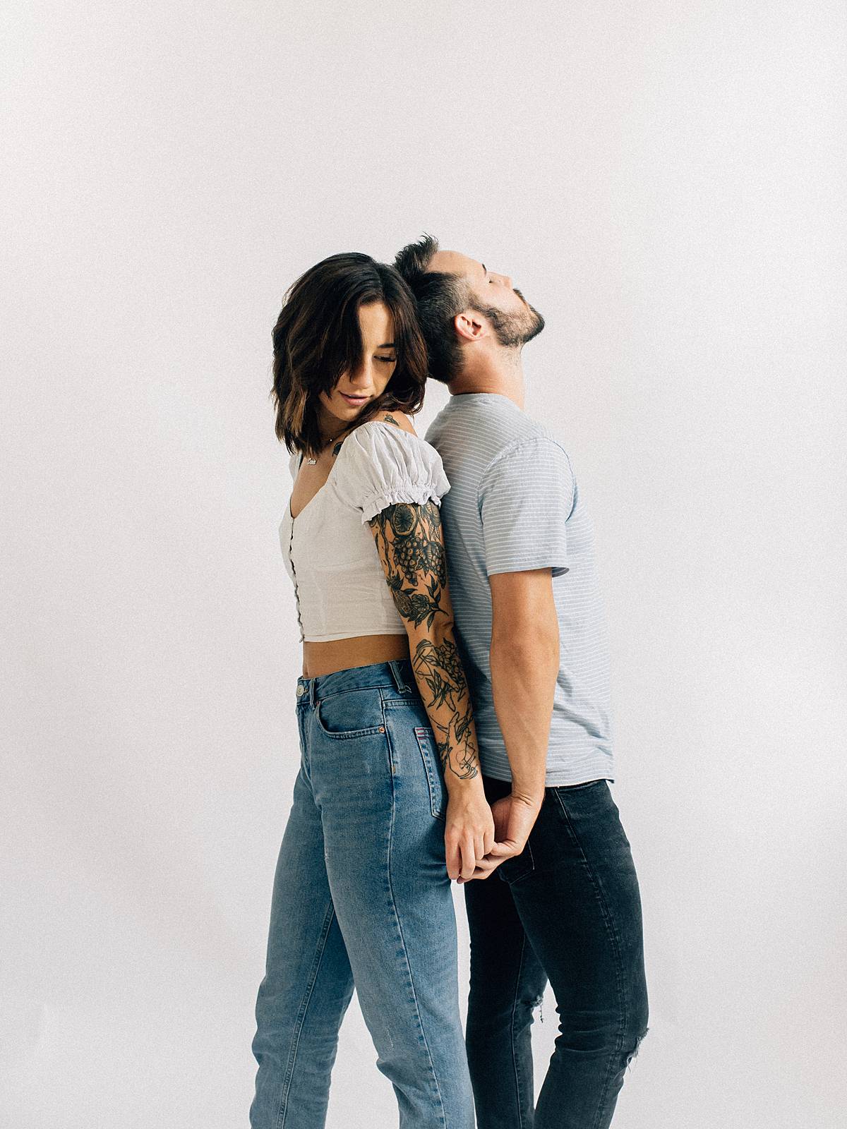 Shot Of A Fashionable Couple Posing At Studio Stock Photo - Download Image  Now - Fashion, Men, Wife - iStock