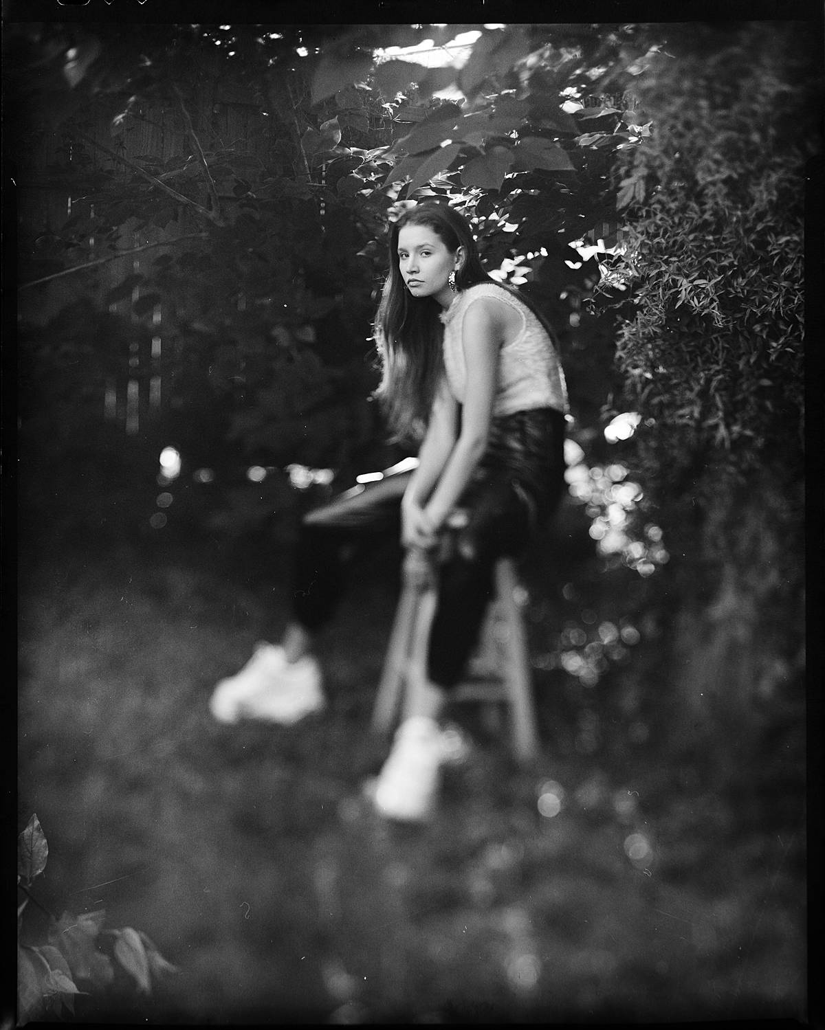 fashion portrait on large format black and white film in charleston sc outdoor portrait photography studio with savage muslin backdrop