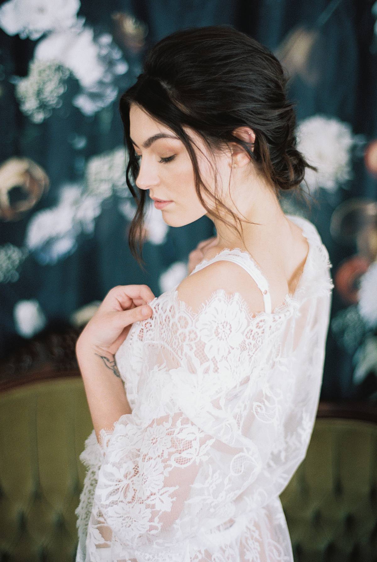 charleston bride in white lace lingerie looking over shoulder with robe on kodak film at wingate plantation