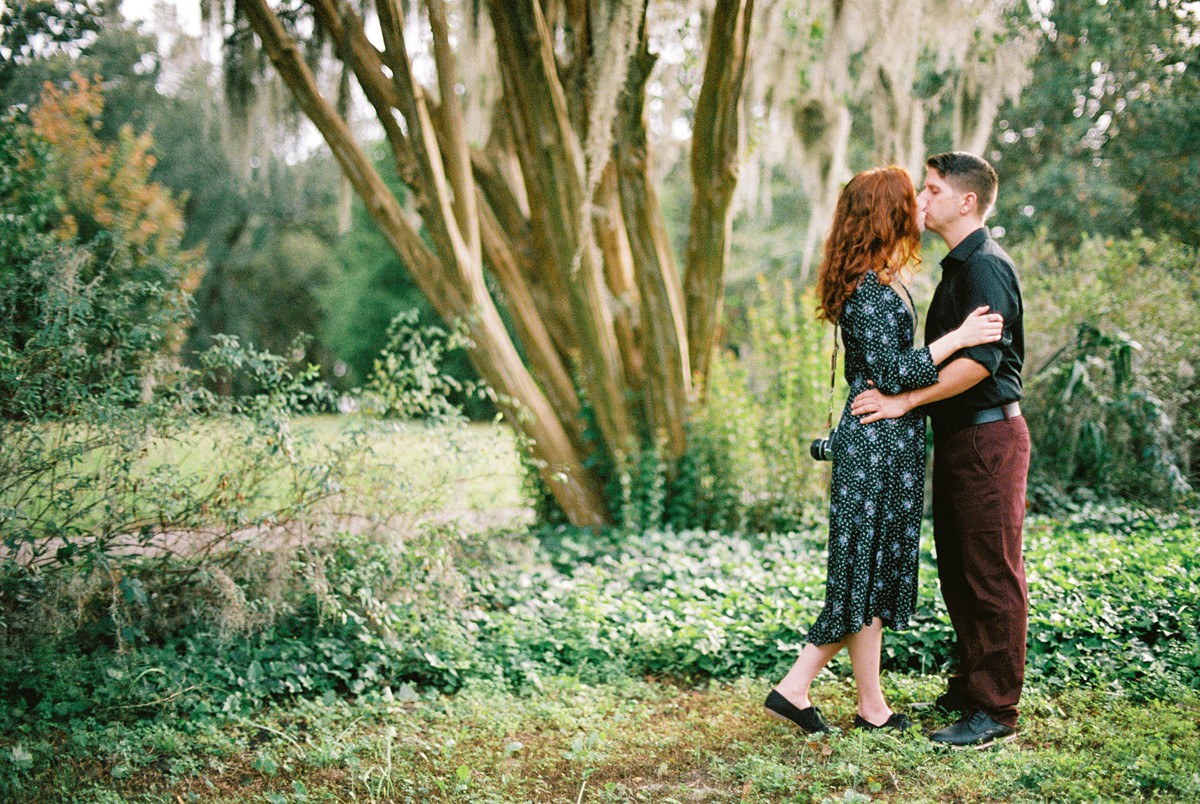 hampton park downtown charleston sc couples portrait session on kodak 35mm portra 400 film with girl in vintage dress