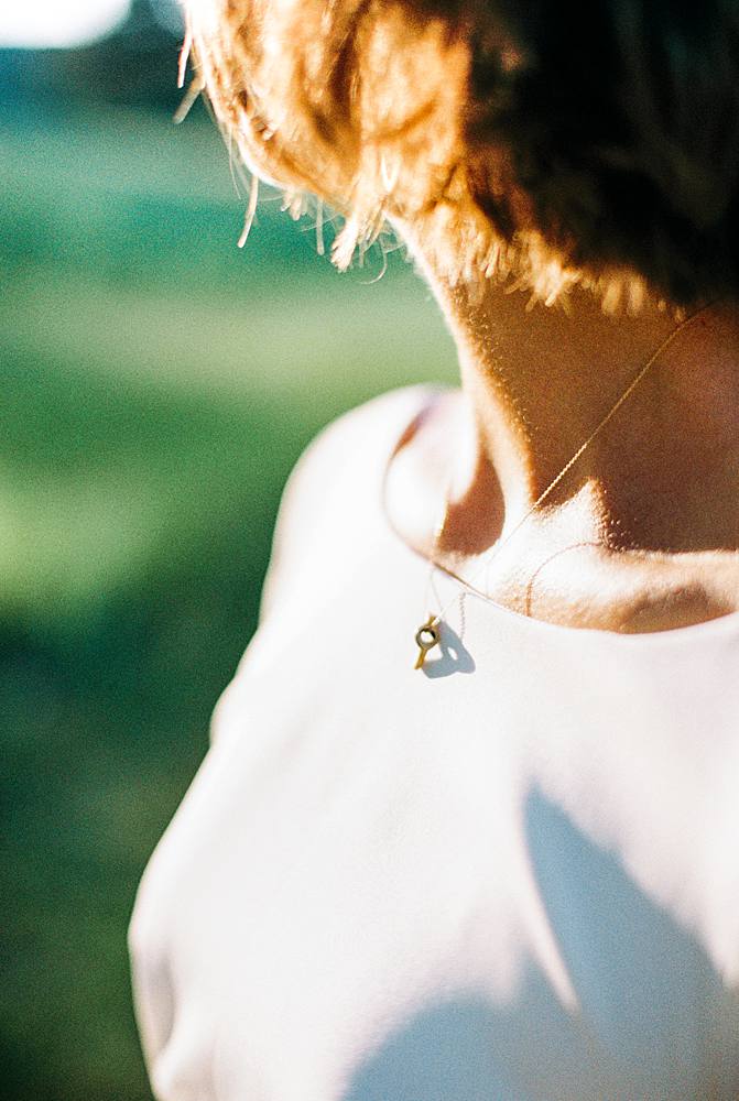 35mm film photograph of bride and wedding dress at sunset at felt mansion by brian d smith photography