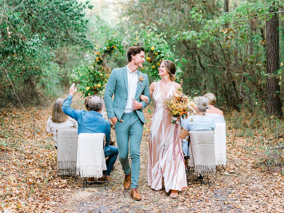 bride and groom recessional cheer during micro wedding at wavering place by charleston wedding photographer brian d smith photography on kodak film