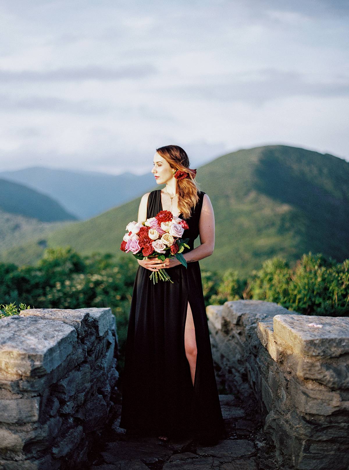 bride on top of blue ridge mountains for bridal portrait during adventure elopement in asheville north carolina