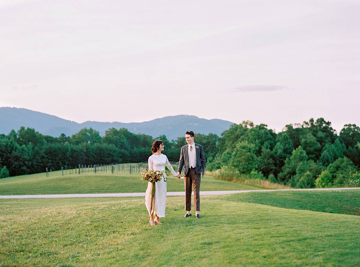 wedding couple during destination elopement photographed in front of blue ridge mountains on kodak film 