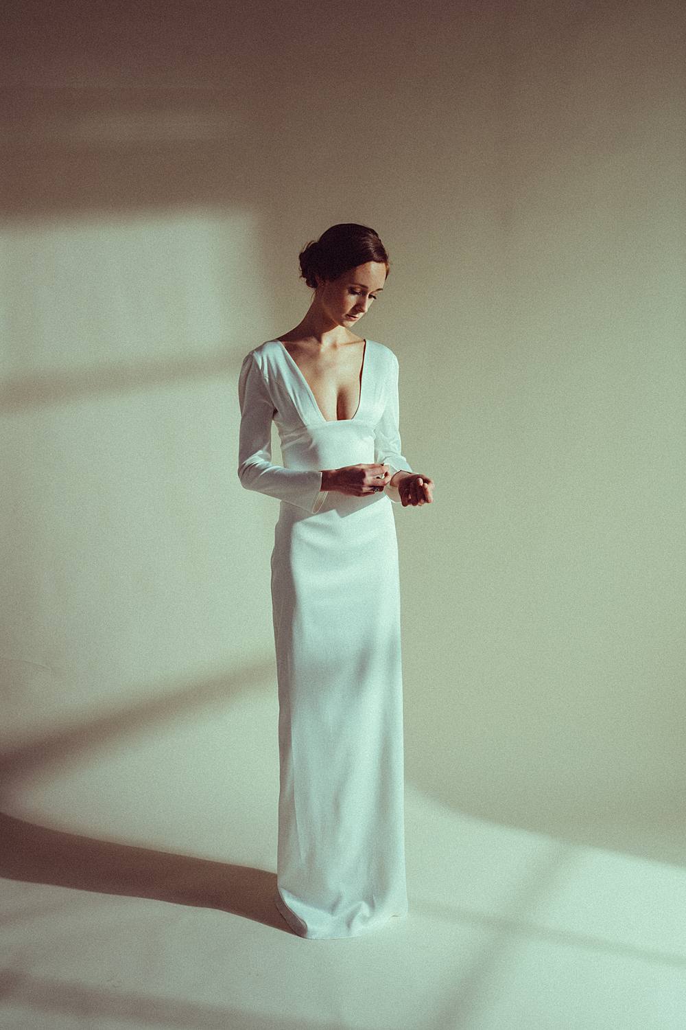 studio bridal portrait in charleston sc vogue inspired editorial with lovely bride dress and dancer model