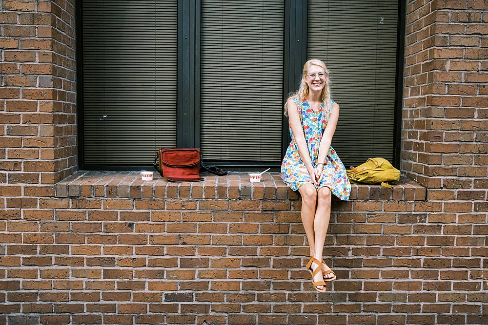 fujifilm x100v documentary photograph of girl eating off track ice cream in charleston sc